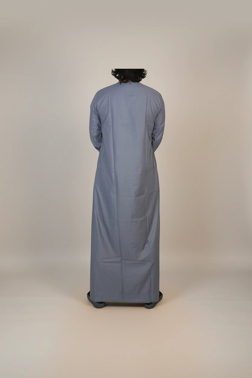 Khayr Thobes grey long sleeve thobe with tassel detail and navy trim. Men's modest Islamic clothing.