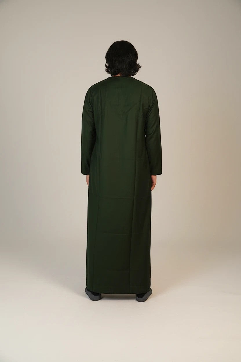 Khayr Thobes traditional Islamic thobe in deep green with gold and cream embroidery on neckline and cuffs. Long sleeves, tassel detail.