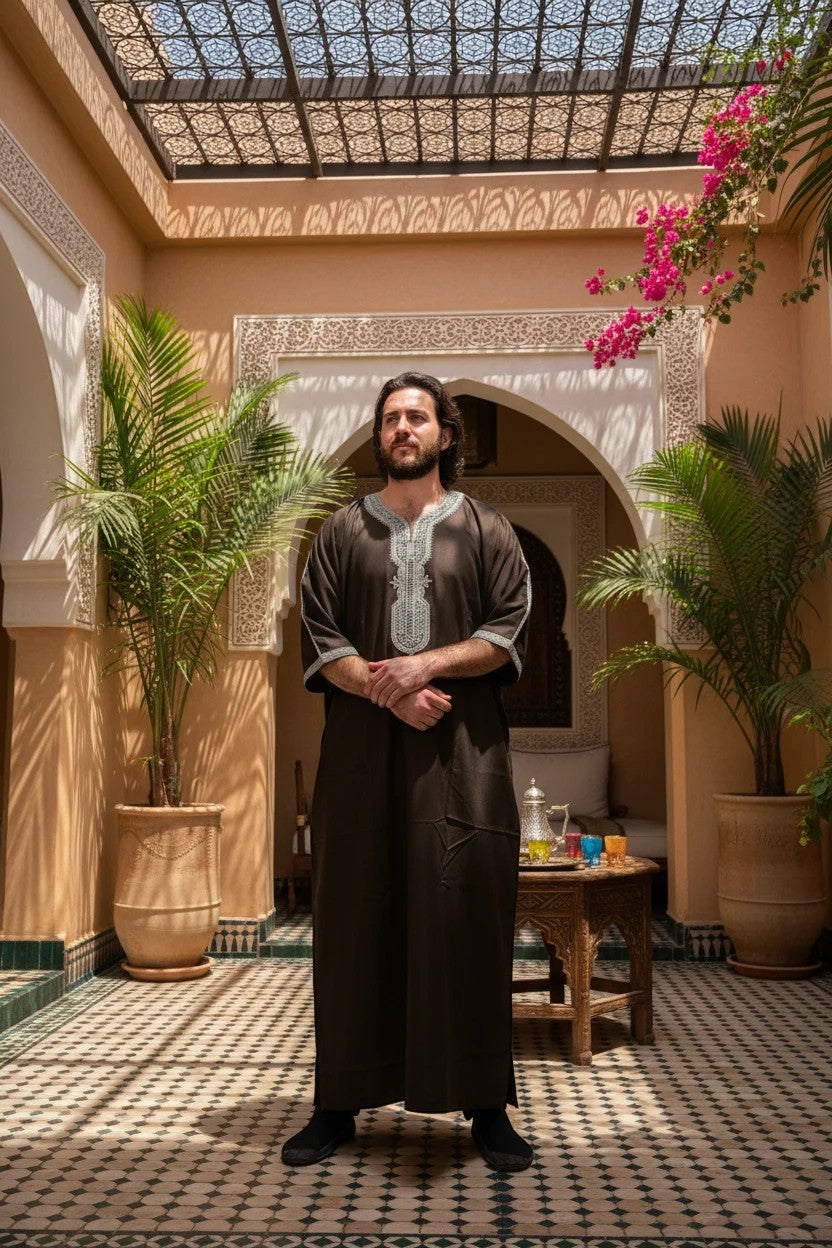 Khayr Thobes men's dark brown embroidered kaftan thobe with silver neckline and cuff detail.
