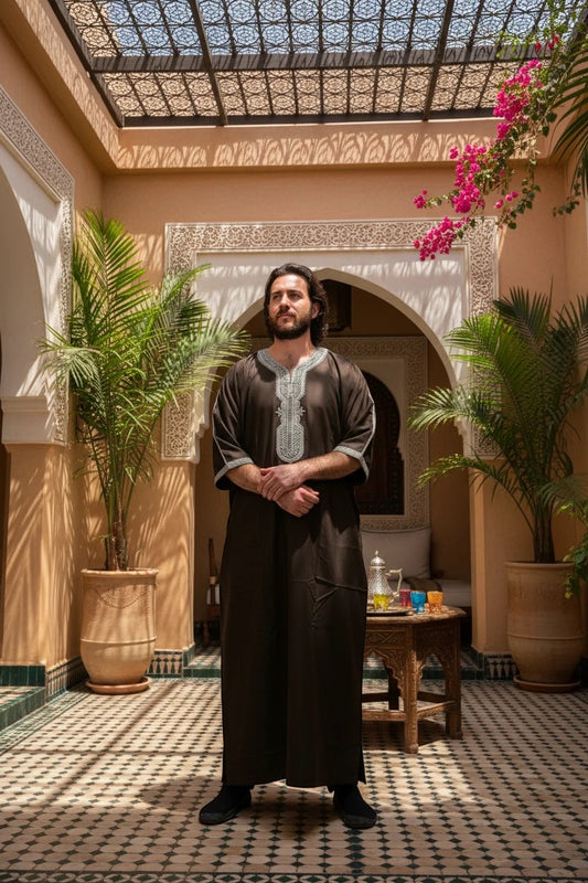 Khayr Thobes men's dark brown embroidered kaftan thobe with silver neckline and cuff detail.