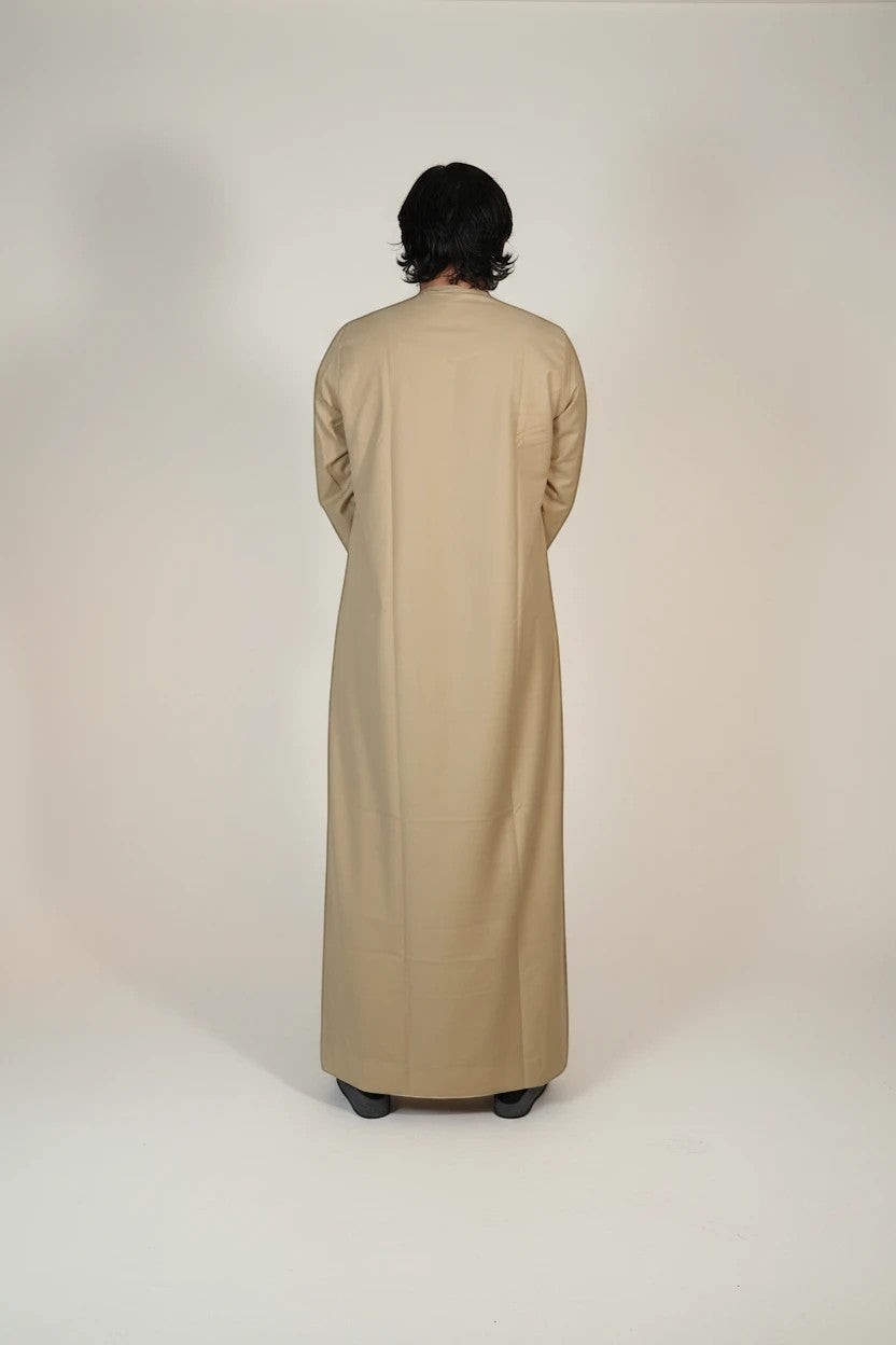Khayr Thobes men's traditional beige thobe robe with mandarin collar and side pocket. Relaxed fit, breathable fabric.
