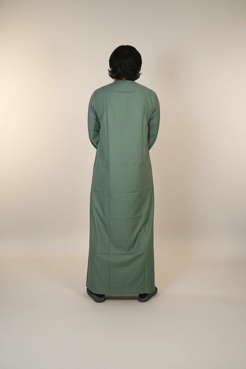 Khayr Thobes men's sage green thobe robe with white embroidery and tassels. Long sleeves, full length.